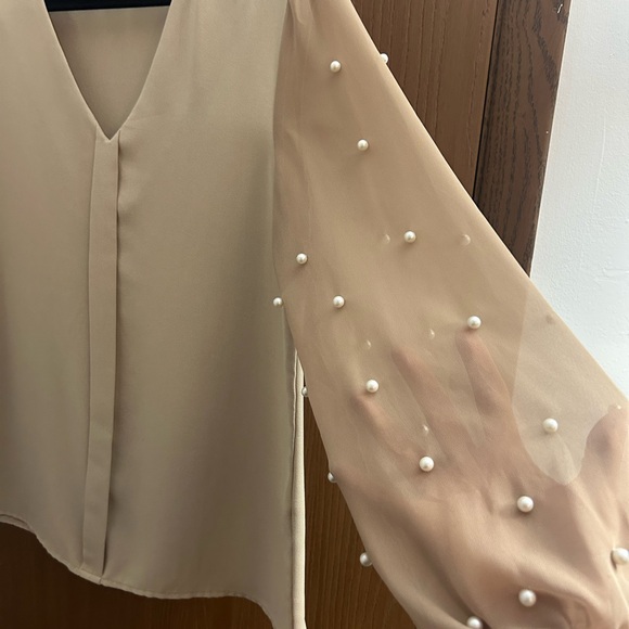 Elegant Cream Blouse with Sheer Sleeves - Picture 4 of 4